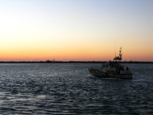 coast guard boat sunset