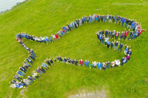aerial image of people making a fish