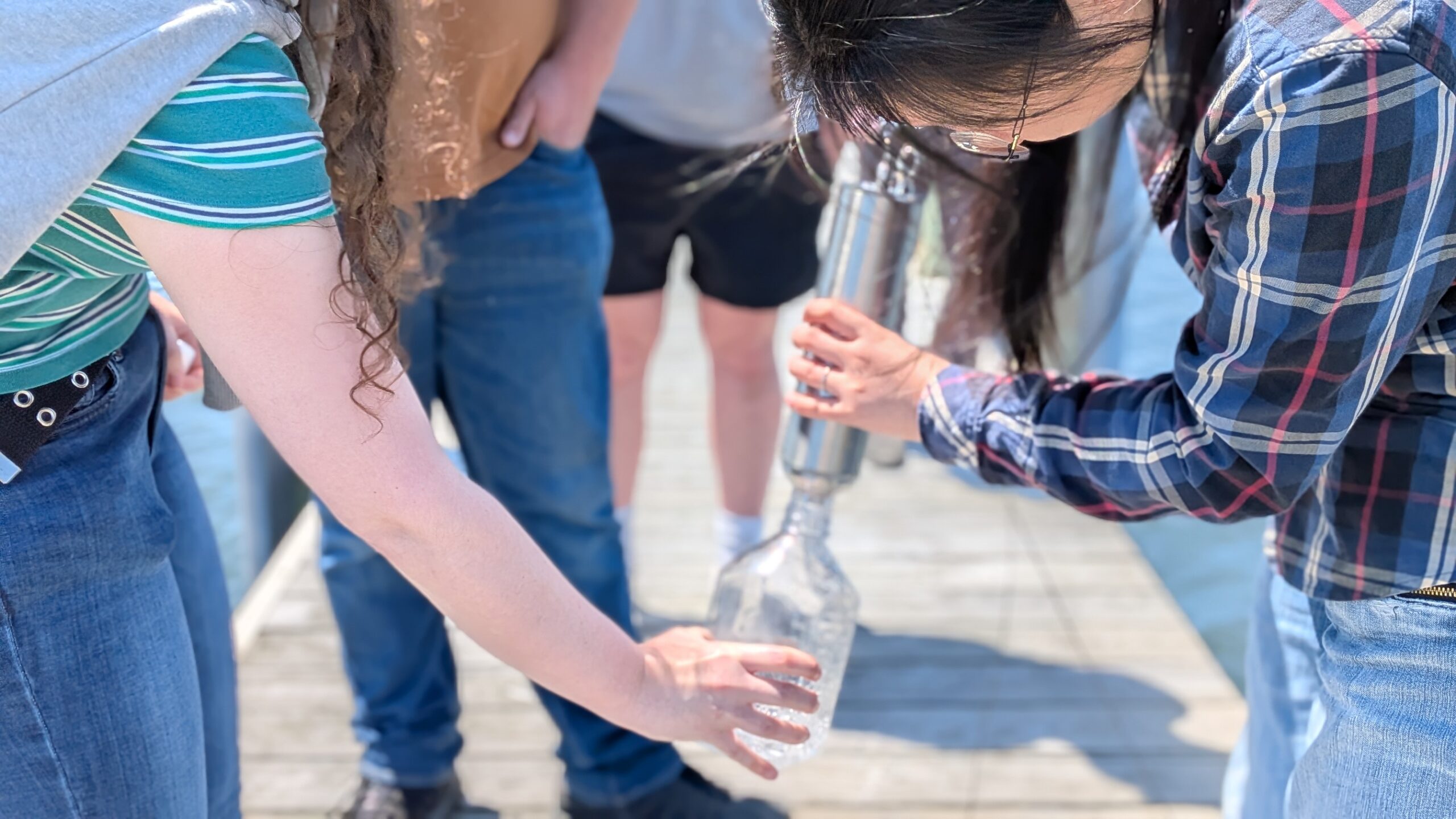 Dr. Shuting Liu and her students collecting chlorophyll